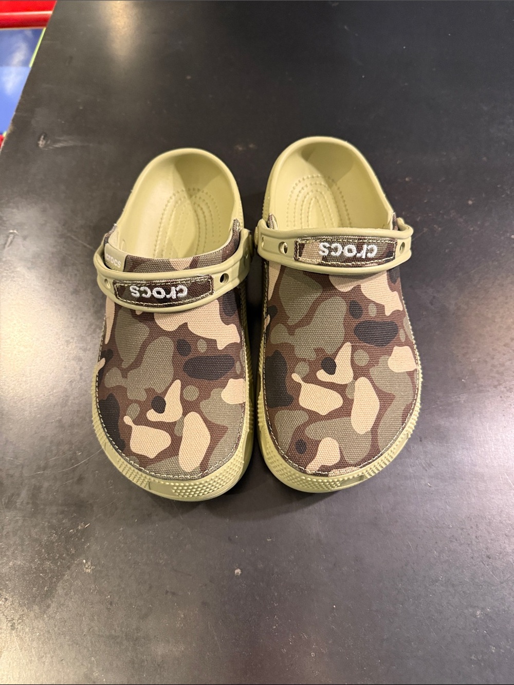 CROCS women’s ' Camo Slip-On Water Shoes in camo Green